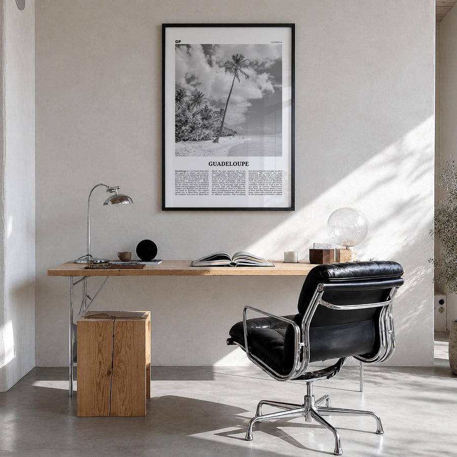 Guadeloupe black & white newspaper poster of Caribbean – vertical wall art in black wood frame, hanging on wall