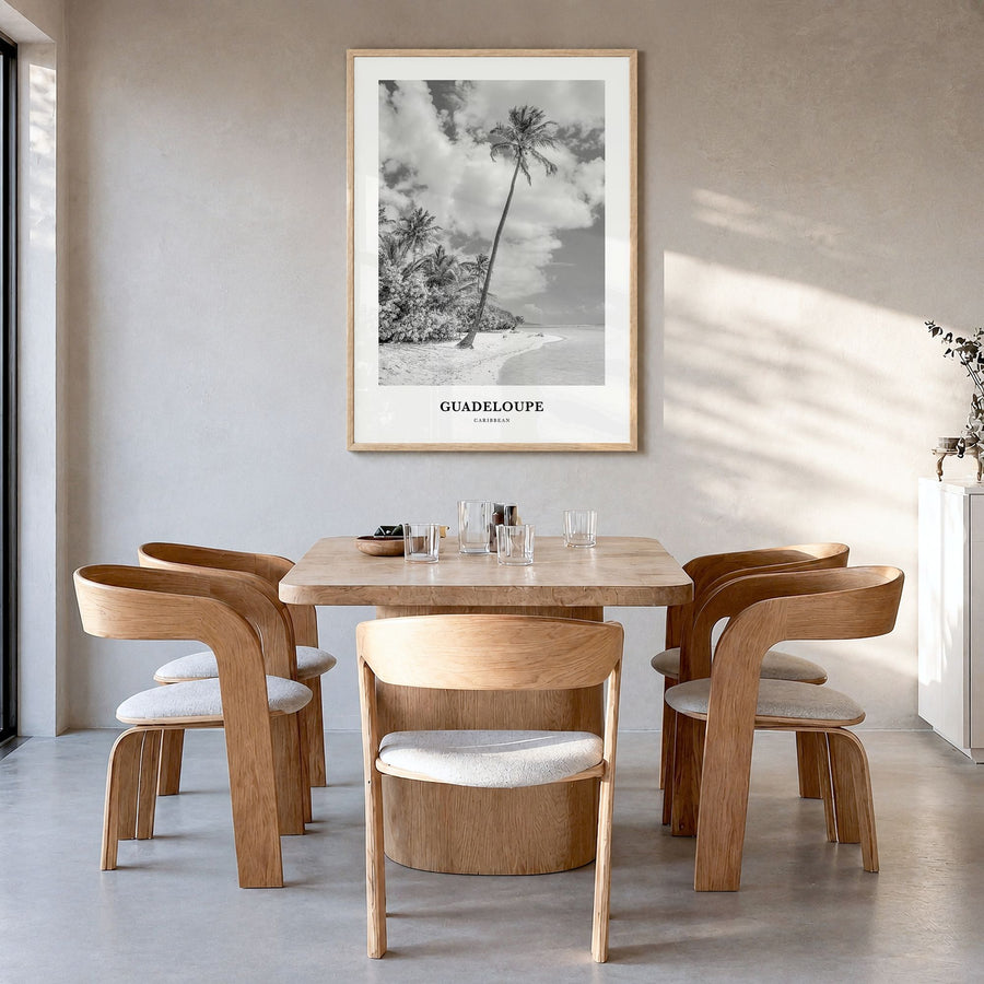 Guadeloupe Classic Poster in a natural wood frame, hanging in a dining room