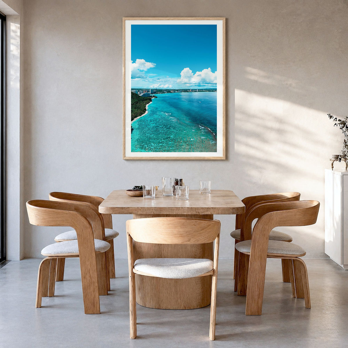 Guam Photo No 1 Poster in a natural wood frame, hanging in a dining room, white border