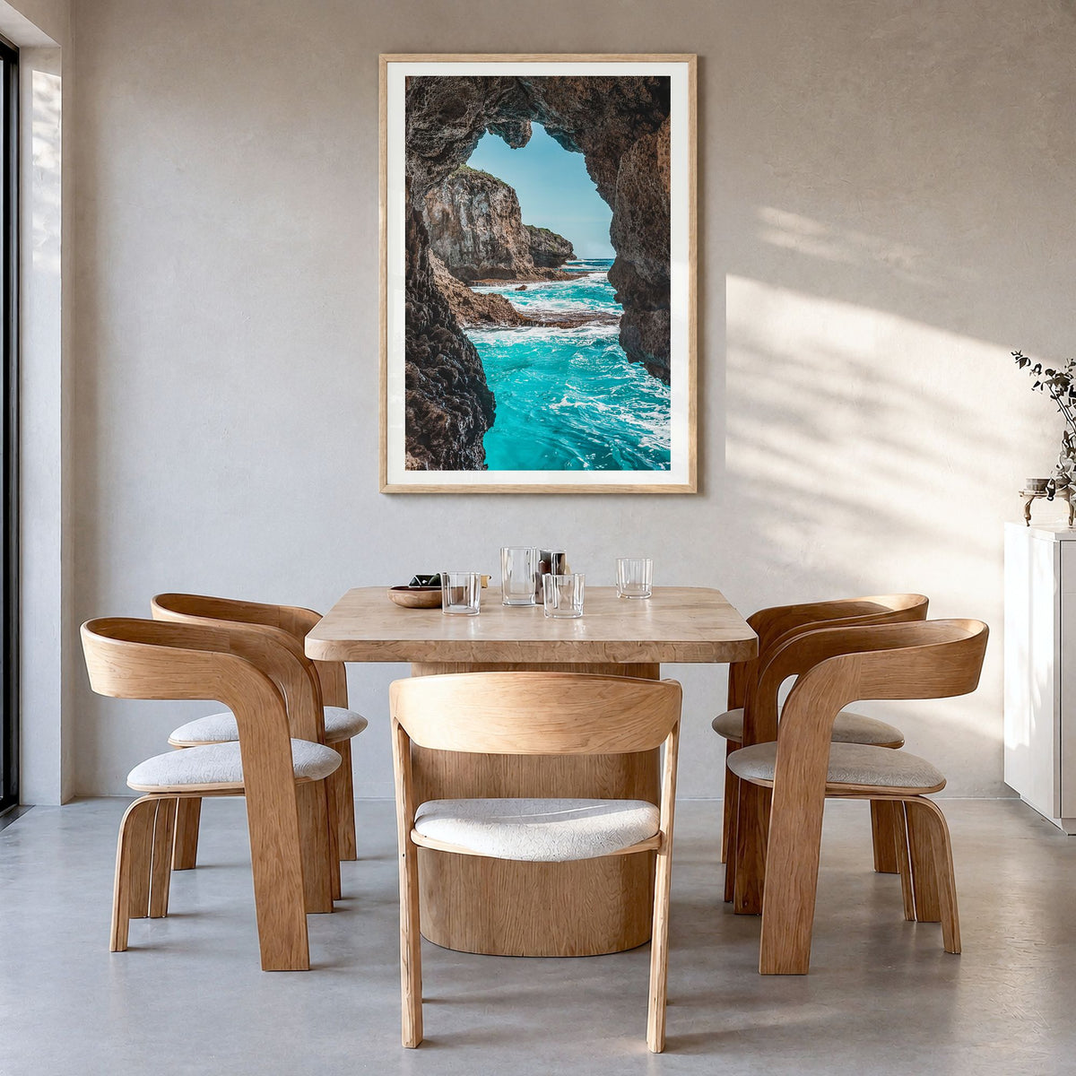 Guam Photo No 2 Poster in a natural wood frame, hanging in a dining room, white border