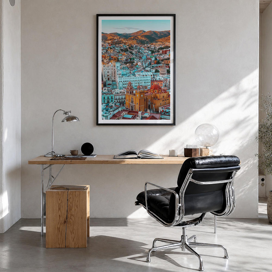Guanajuato City colorful photo poster of Mexico – vertical wall art in black wood frame with white border, hanging on wall