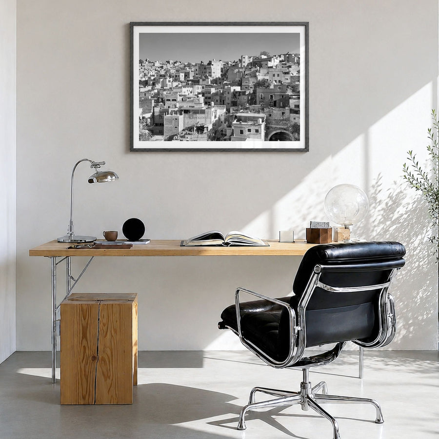Guanajuato City Photo Poster in a black wood frame, hanging in a bright home office, white border