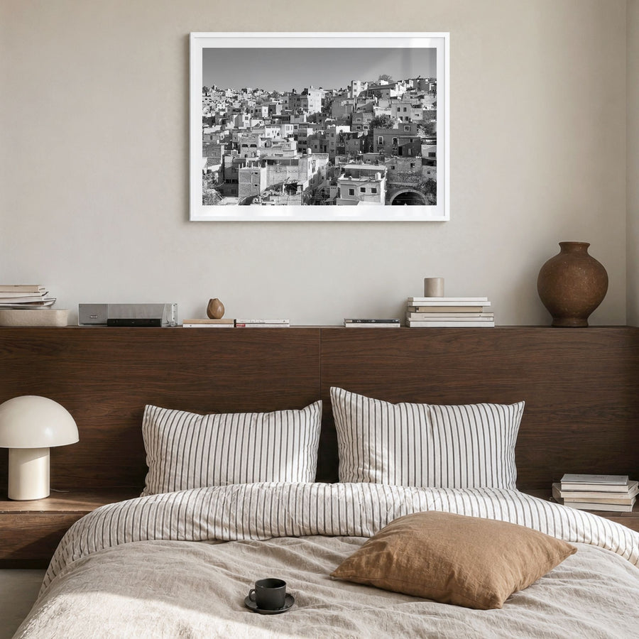 Guanajuato City Photo Poster in a white wood frame, hanging in a bedroom, white border