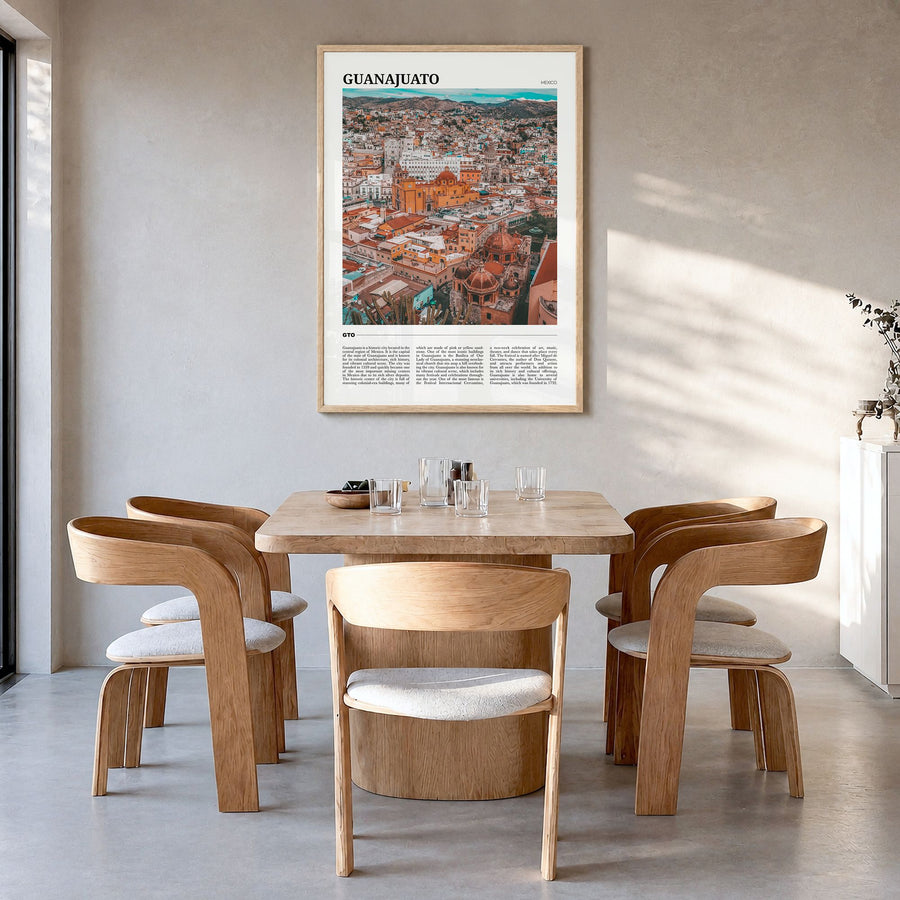 Guanajuato City Travel Poster in a natural wood frame, hanging in a dining room