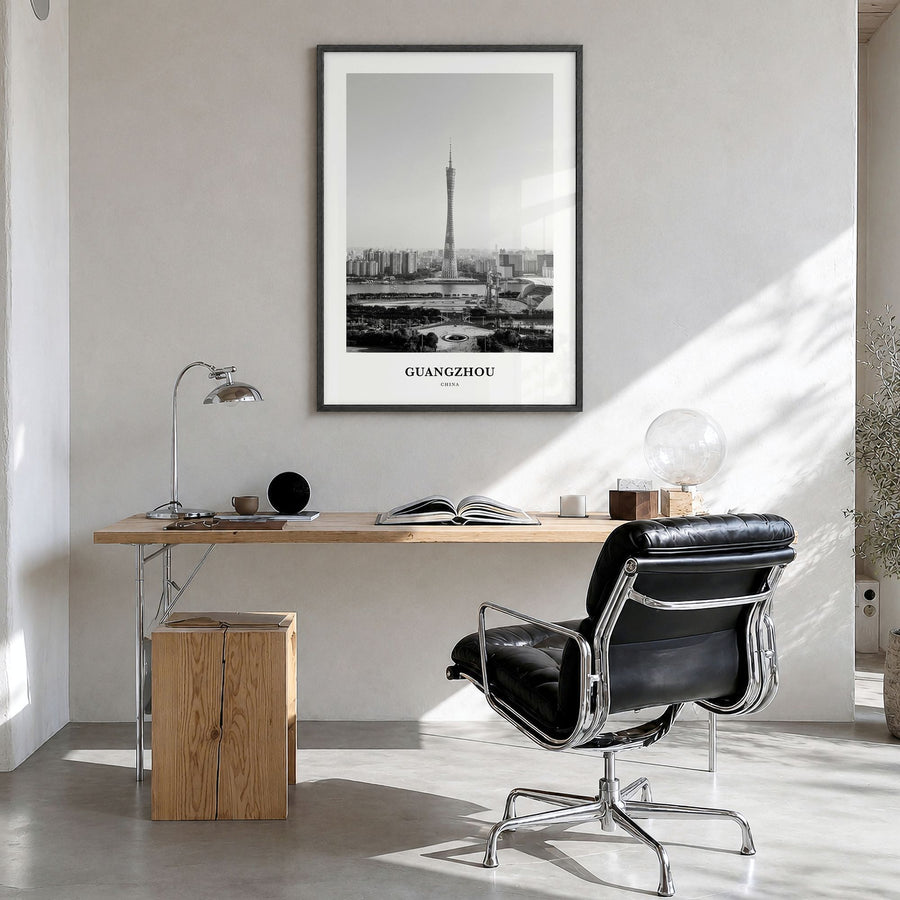 Guangzhou Classic Poster in a black wood frame, hanging in a bright home office