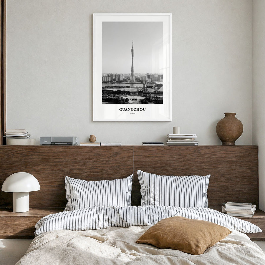 Guangzhou Classic Poster in a white wood frame, hanging in a bedroom