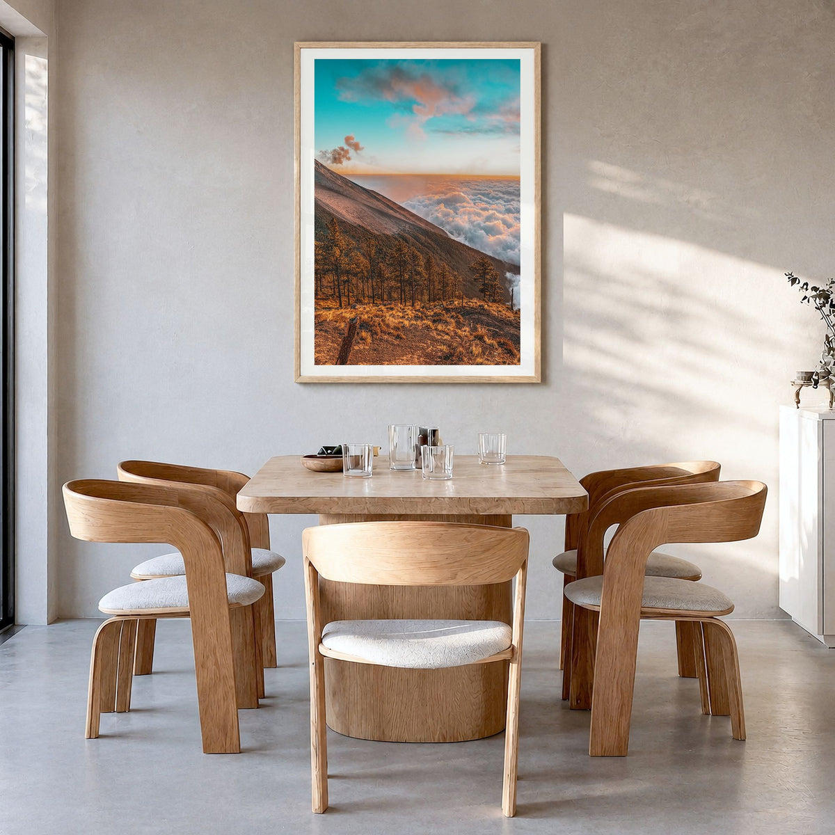 Guatemala Photo Poster in a natural wood frame, hanging in a dining room, white border