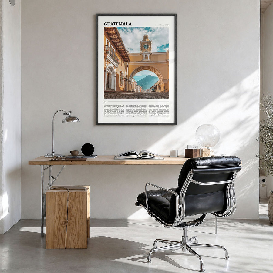 Guatemala Travel Poster in a black wood frame, hanging in a bright home office
