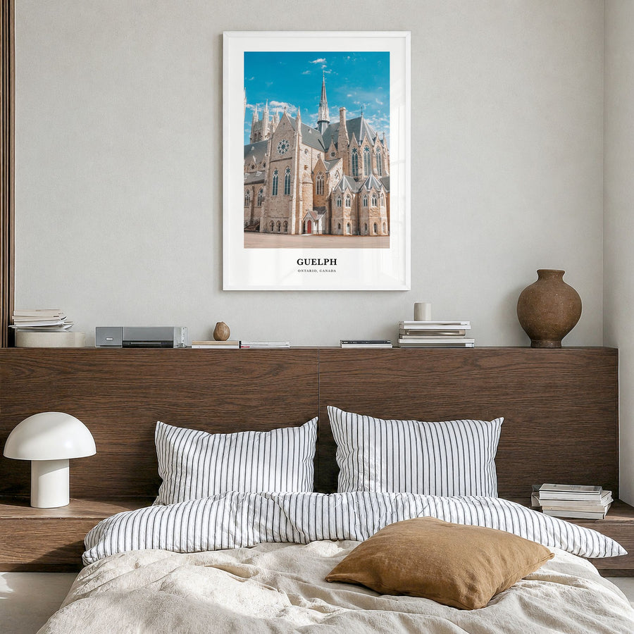 Guelph Classic Poster in a white wood frame, hanging in a bedroom