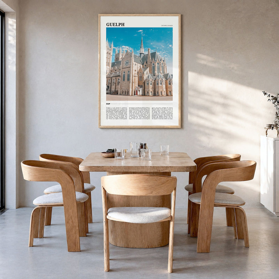 Guelph Travel Poster in a natural wood frame, hanging in a dining room