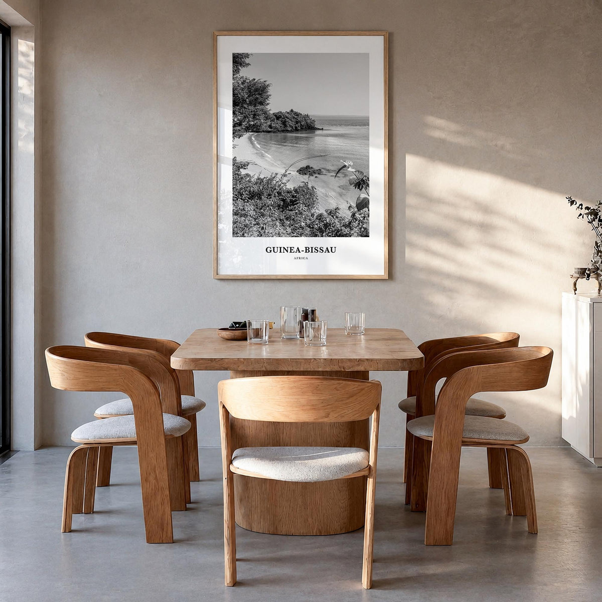 Guinea-Bissau black & white classic poster of Africa – vertical wall art in natural wood frame, hanging on wall