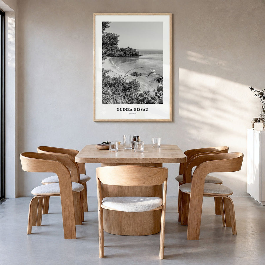 Guinea-Bissau Classic Poster in a natural wood frame, hanging in a dining room