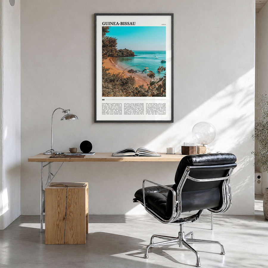 Guinea-Bissau Travel Poster in a black wood frame, hanging in a bright home office