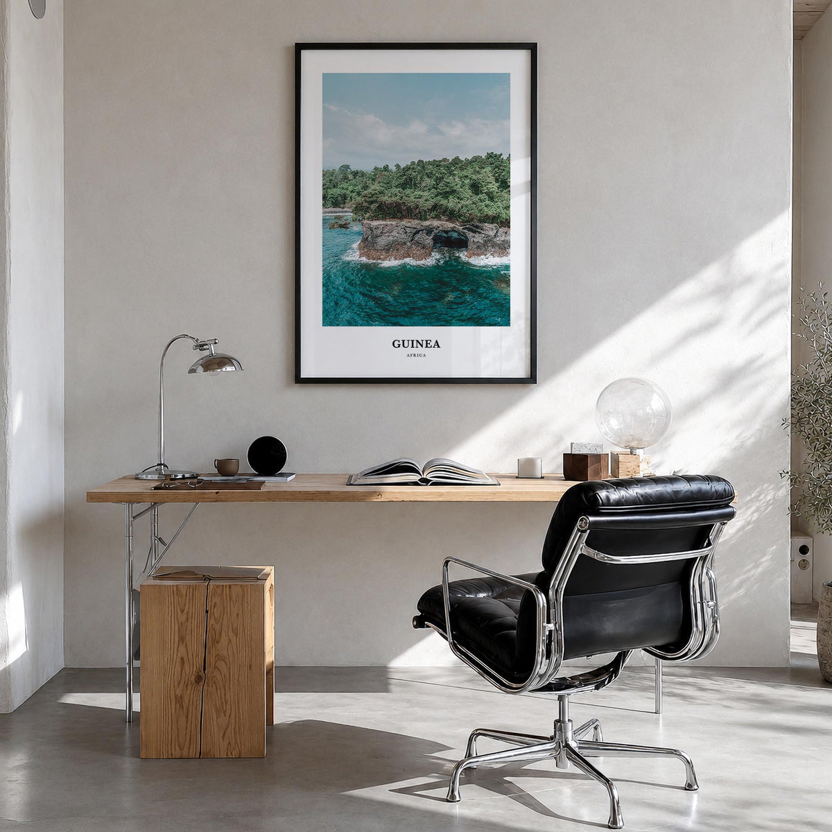 Guinea no. 1 colorful classic poster of Africa – vertical wall art in black wood frame, hanging on wall