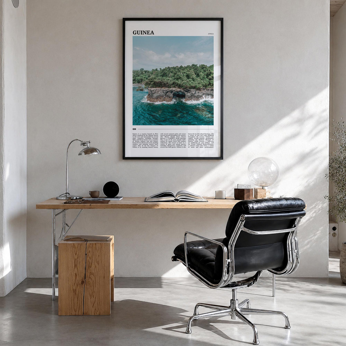 Guinea no. 1 colorful travel poster of Africa – vertical wall art in black wood frame, hanging on wall