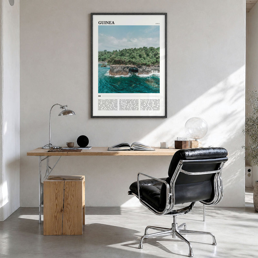 Guinea Travel No 1 Poster in a black wood frame, hanging in a bright home office