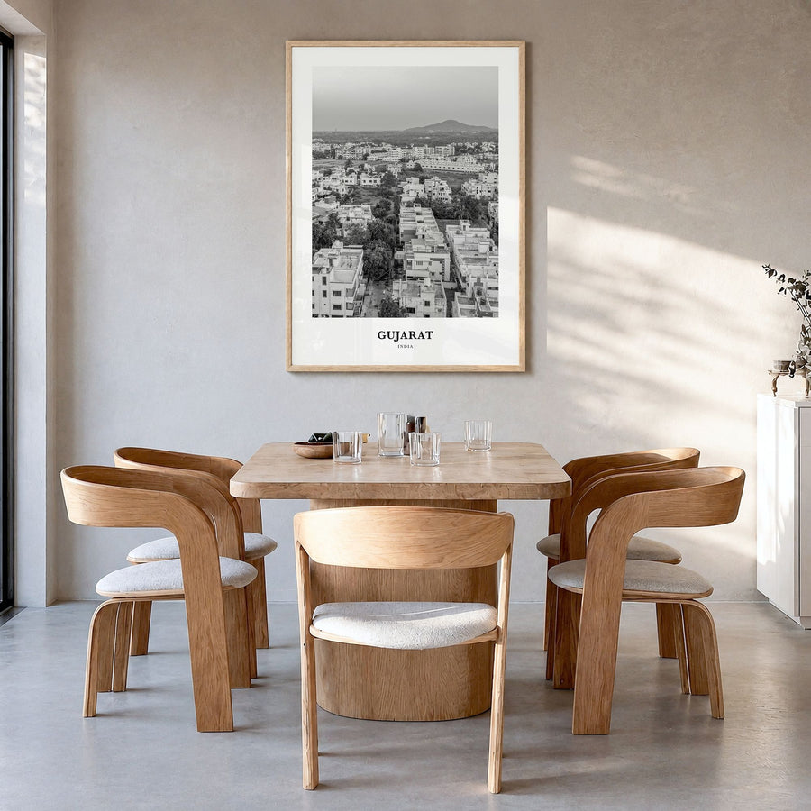 Gujarat Classic Poster in a natural wood frame, hanging in a dining room
