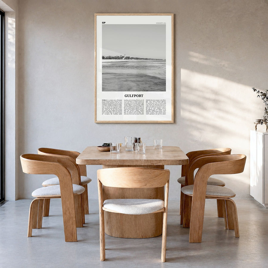 Gulfport Newspaper Poster in a natural wood frame, hanging in a dining room