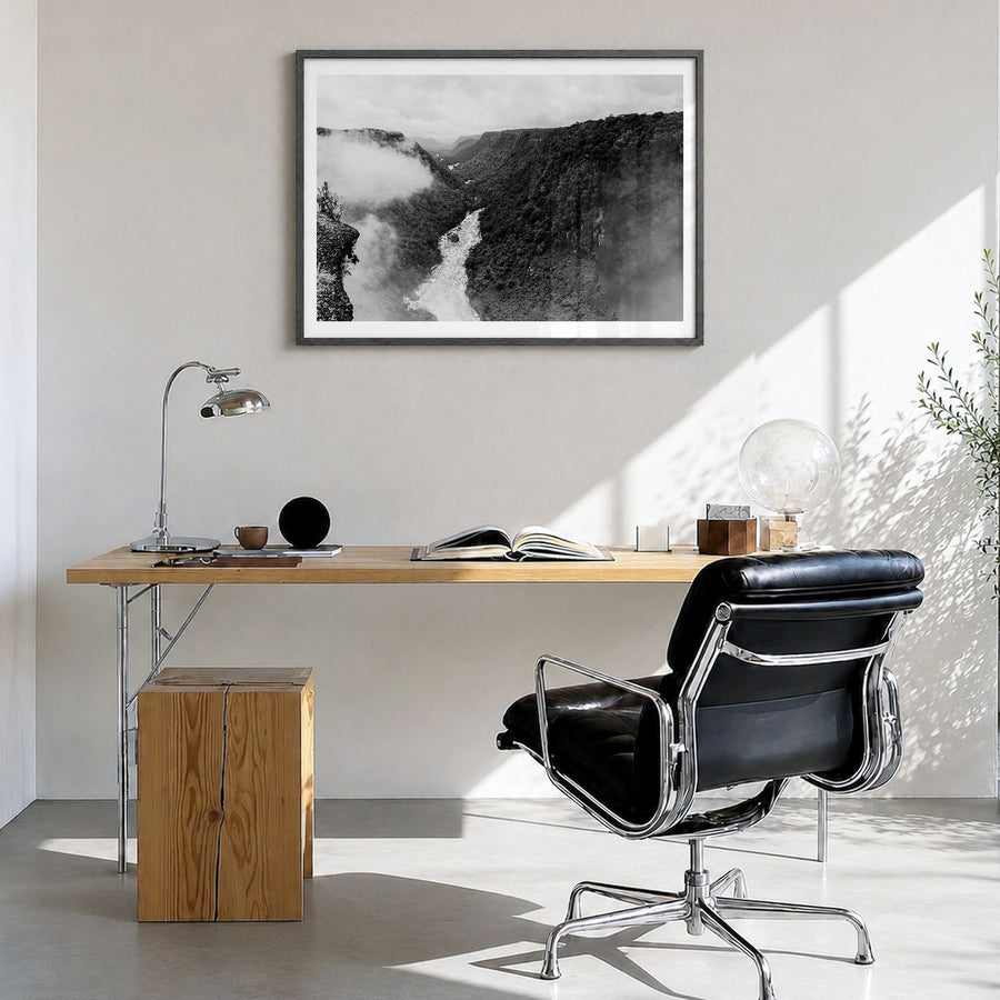 Guyana Photo Poster in a black wood frame, hanging in a bright home office, white border