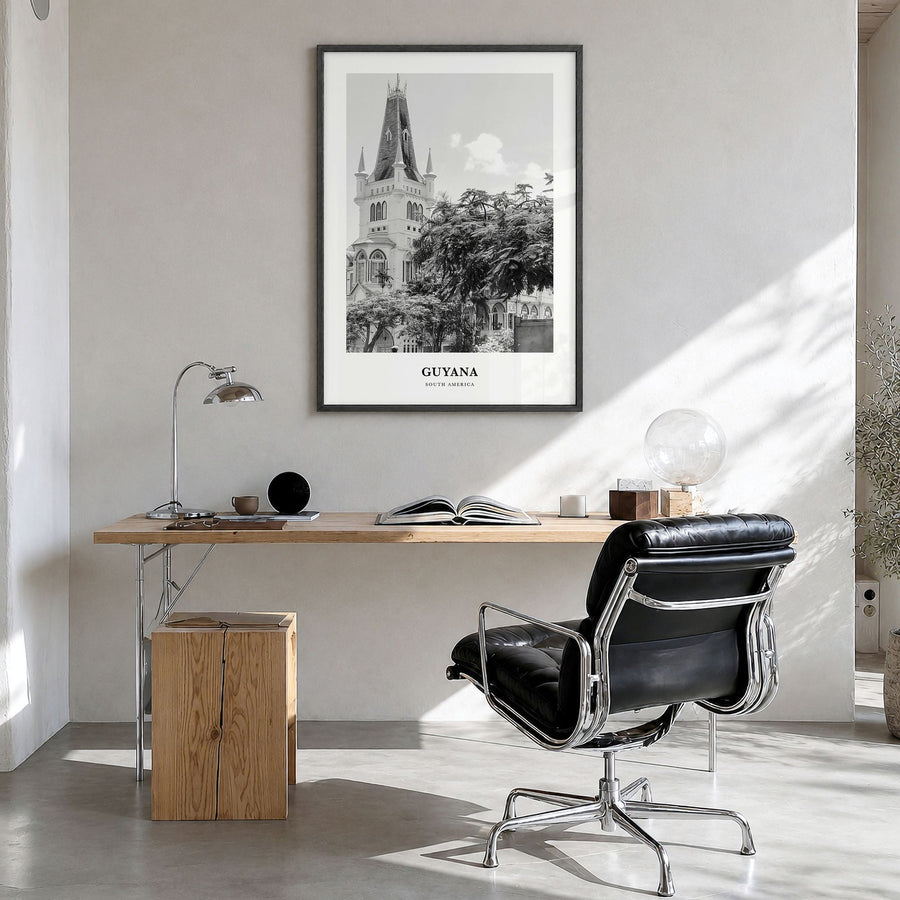 Guyana Classic Poster in a black wood frame, hanging in a bright home office