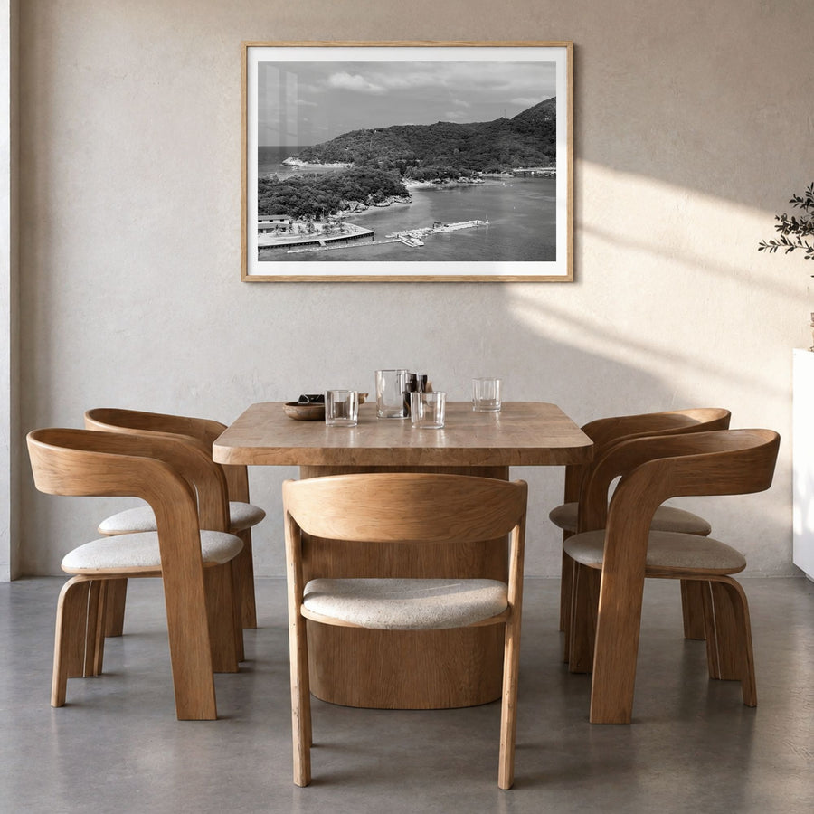 Haiti Photo Poster in a natural wood frame, hanging in a dining room, white border