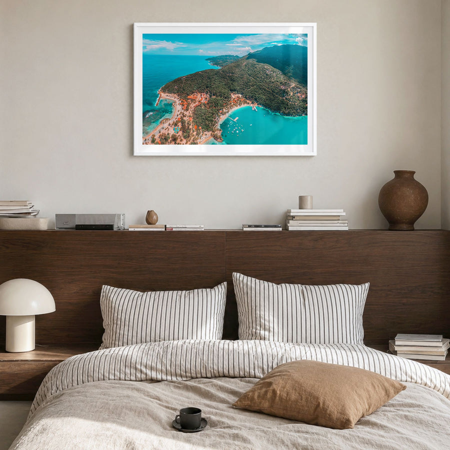 Haiti Photo Poster in a white wood frame, hanging in a bedroom, white border