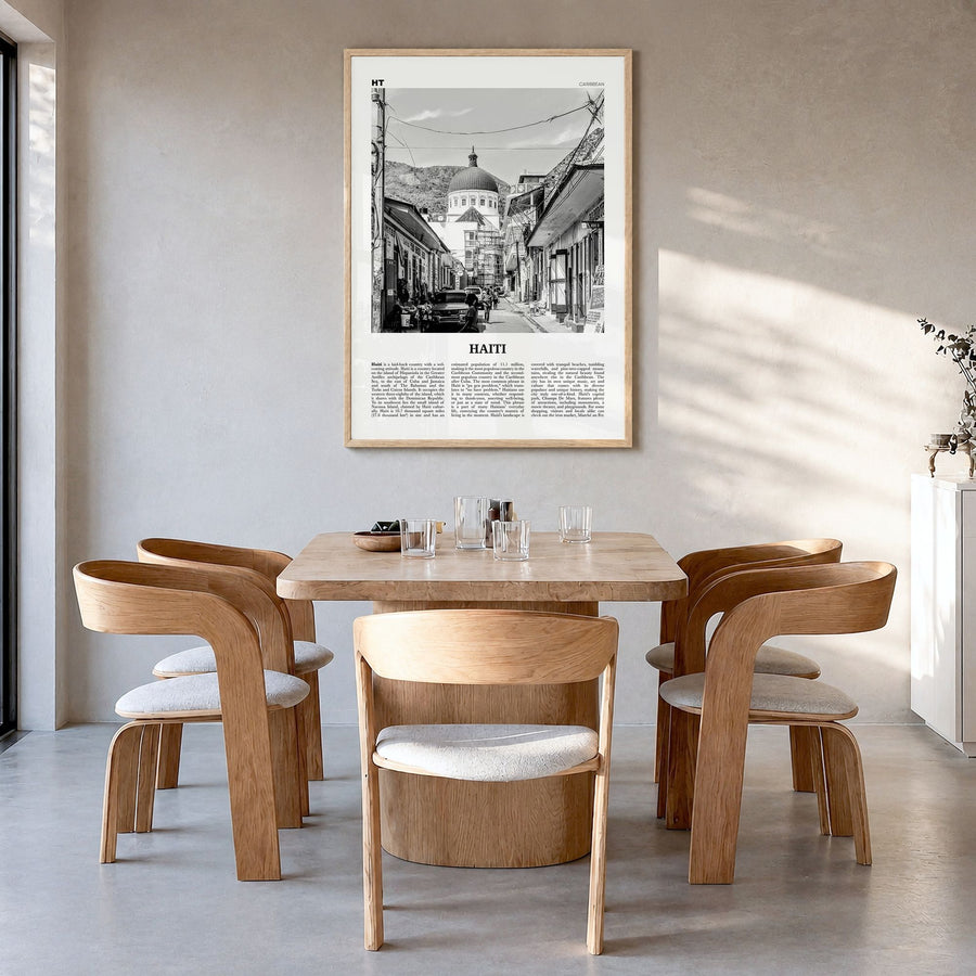 Haiti Newspaper No 2 Poster in a natural wood frame, hanging in a dining room