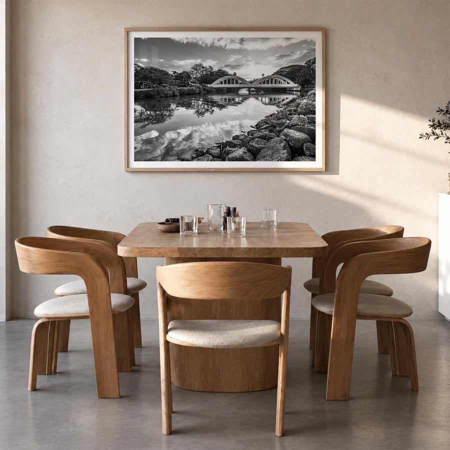 Haleiwa black & white photo poster of Hawaii, USA – horizontal wall art in natural wood frame with white border, hanging on w
