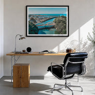 Haleiwa colorful photo poster of Hawaii, USA – horizontal wall art in black wood frame with white border, hanging on wall