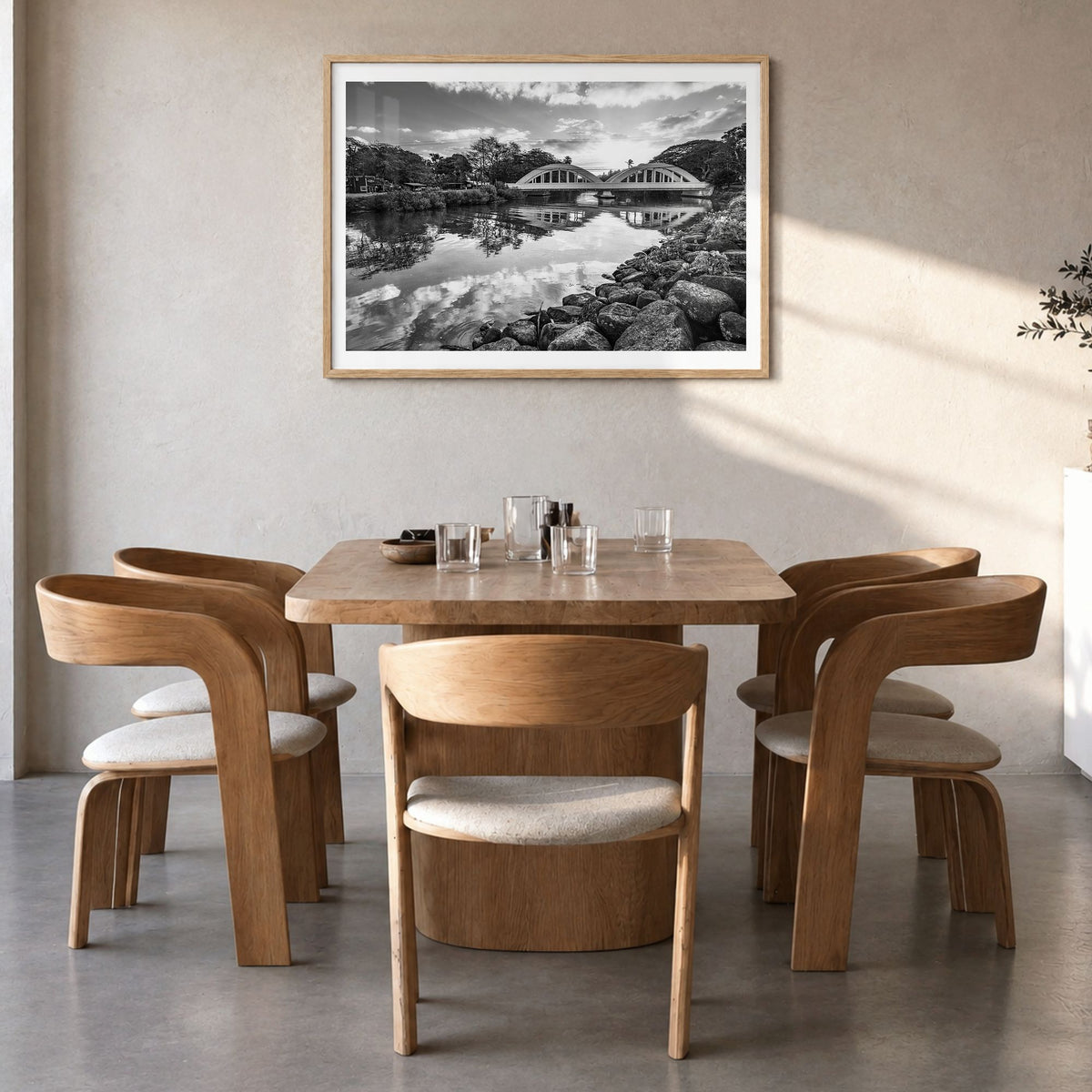 Haleiwa Photo Poster in a natural wood frame, hanging in a dining room, white border