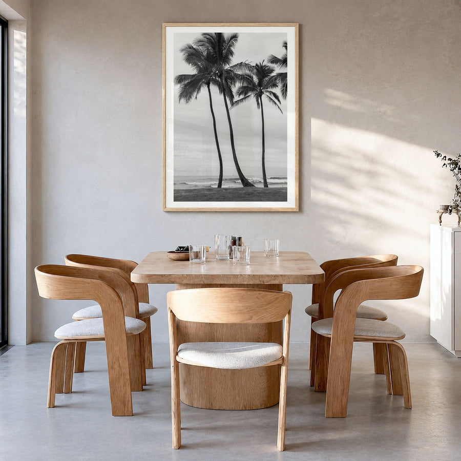 Haleiwa Photo Poster in a natural wood frame, hanging in a dining room, white border