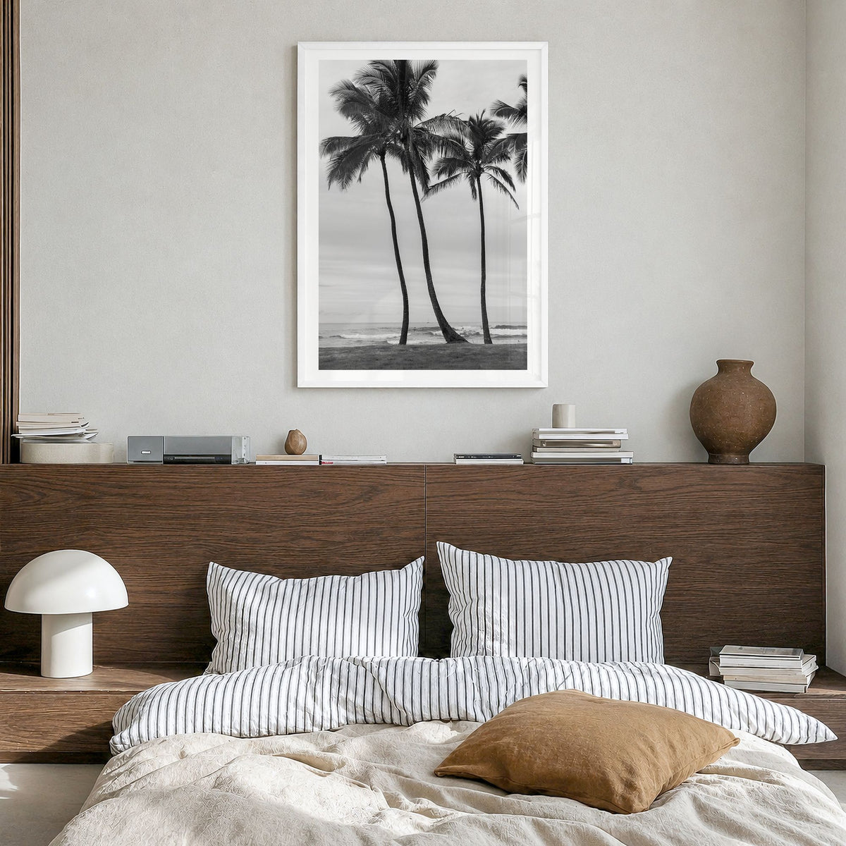 Haleiwa Photo Poster in a white wood frame, hanging in a bedroom, white border