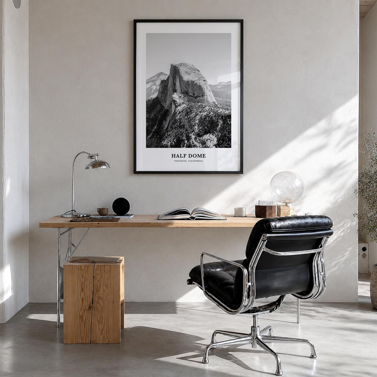 Half Dome black & white classic poster of Yosemite, California – vertical wall art in black wood frame, hanging on wall