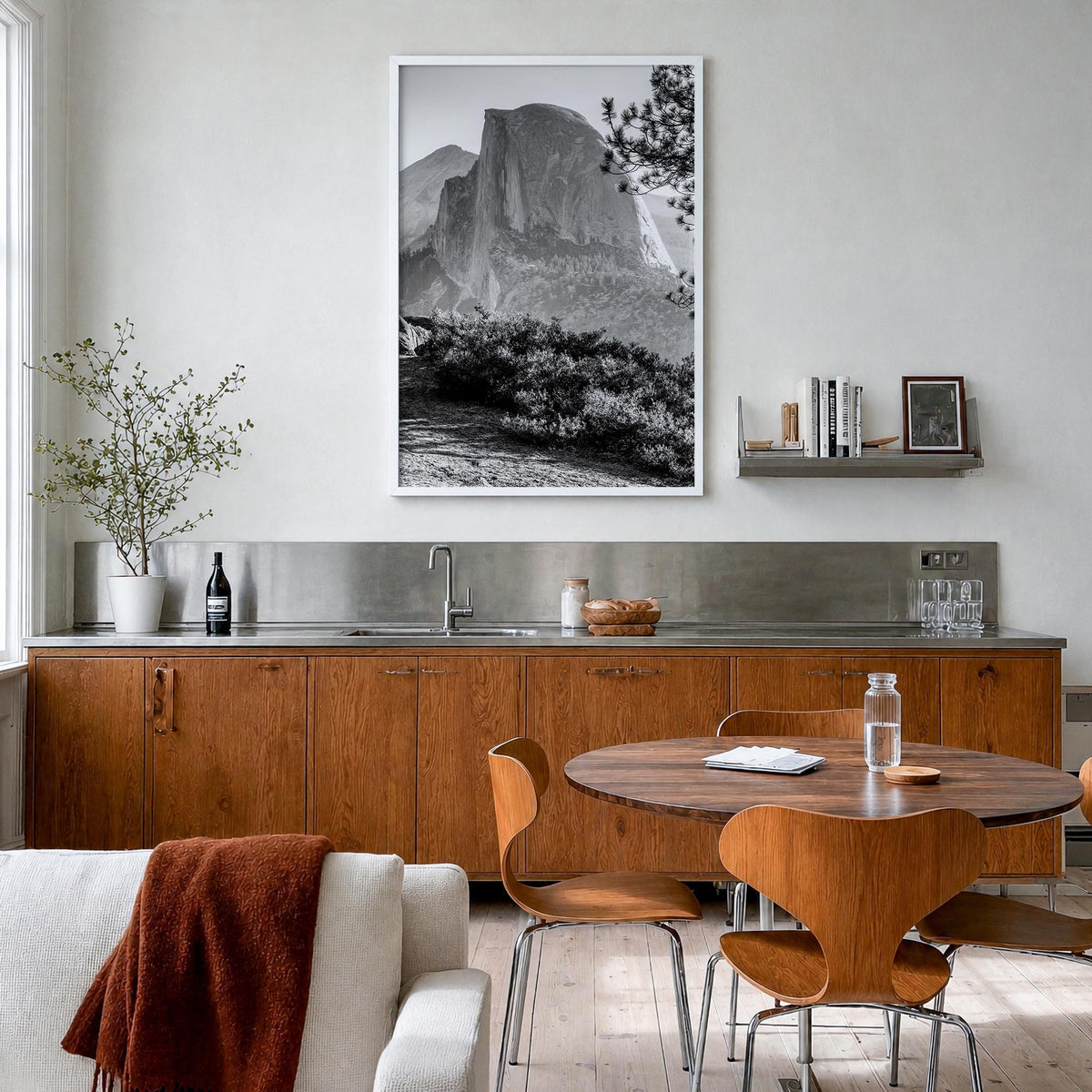Half Dome black & white photo poster of Yosemite, California – vertical wall art in white wood frame, hanging on wall
