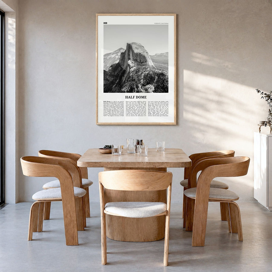 Half Dome Newspaper Poster in a natural wood frame, hanging in a dining room