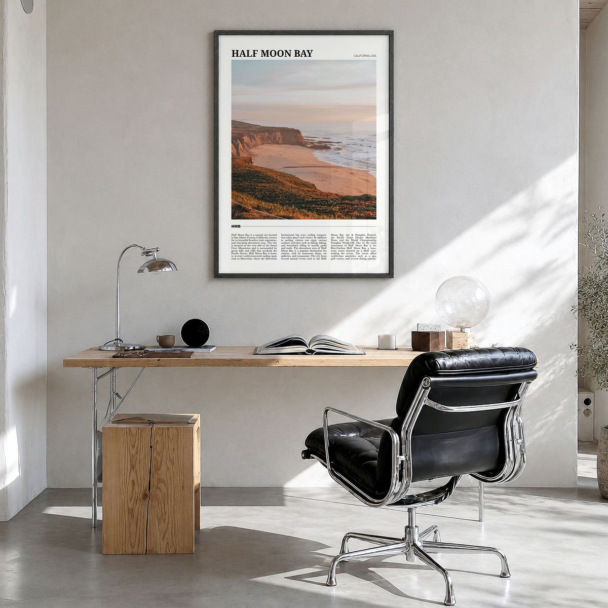 Half Moon Bay Travel No 1 Poster in a black wood frame, hanging in a bright home office