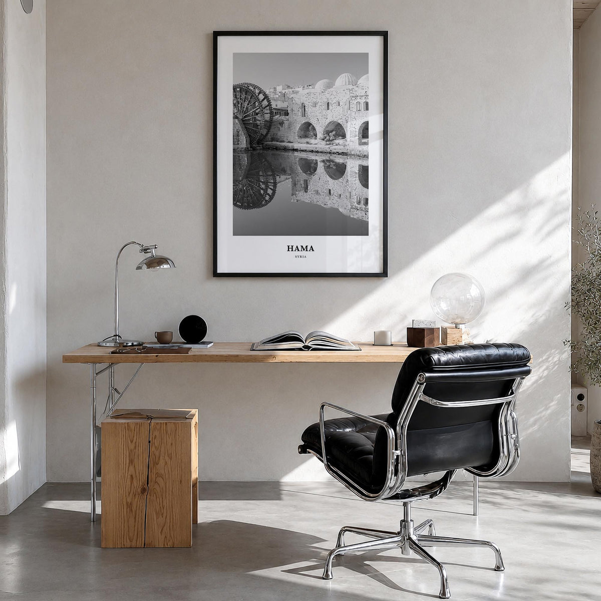 Hama black & white classic poster of Syria – vertical wall art in black wood frame, hanging on wall