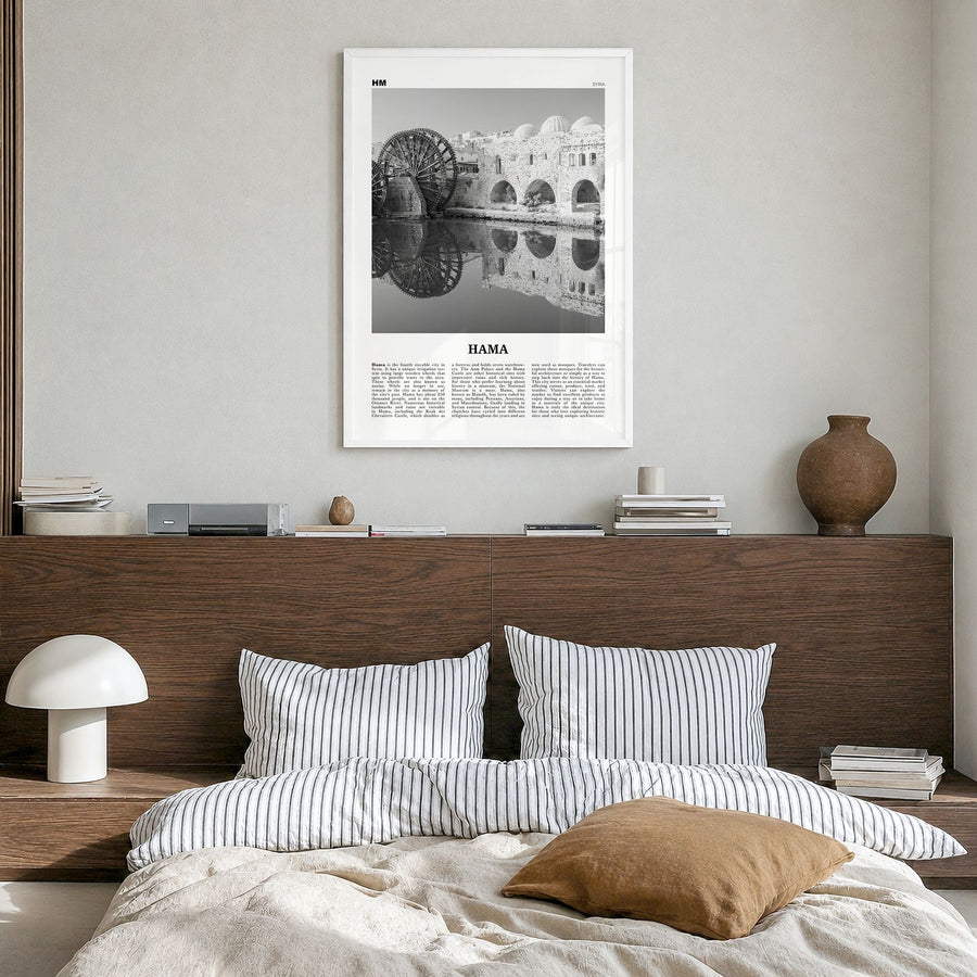 Hama Newspaper Poster in a white wood frame, hanging in a bedroom