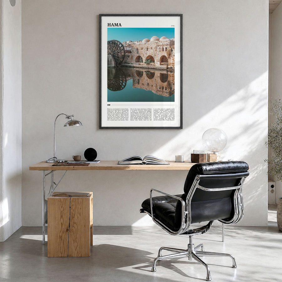 Hama Travel Poster in a black wood frame, hanging in a bright home office