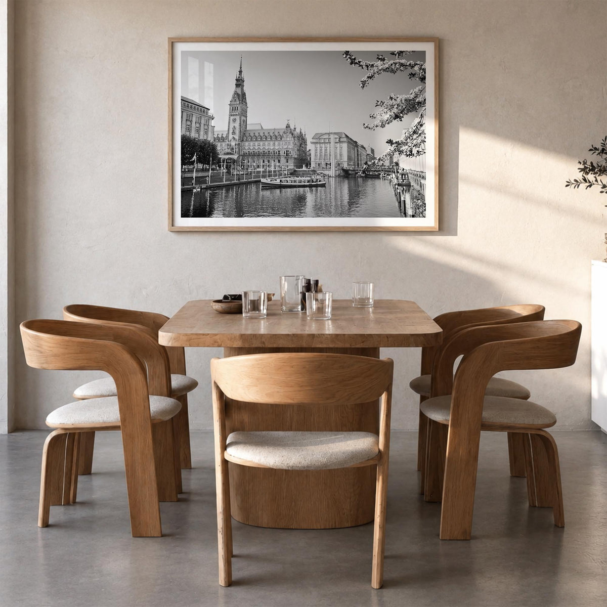 Hamburg black & white photo poster of Germany – horizontal wall art in natural wood frame with white border, hanging on wall