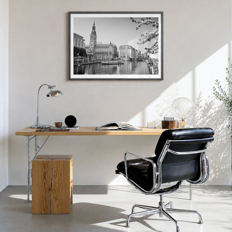 Hamburg Photo Poster in a black wood frame, hanging in a bright home office, white border