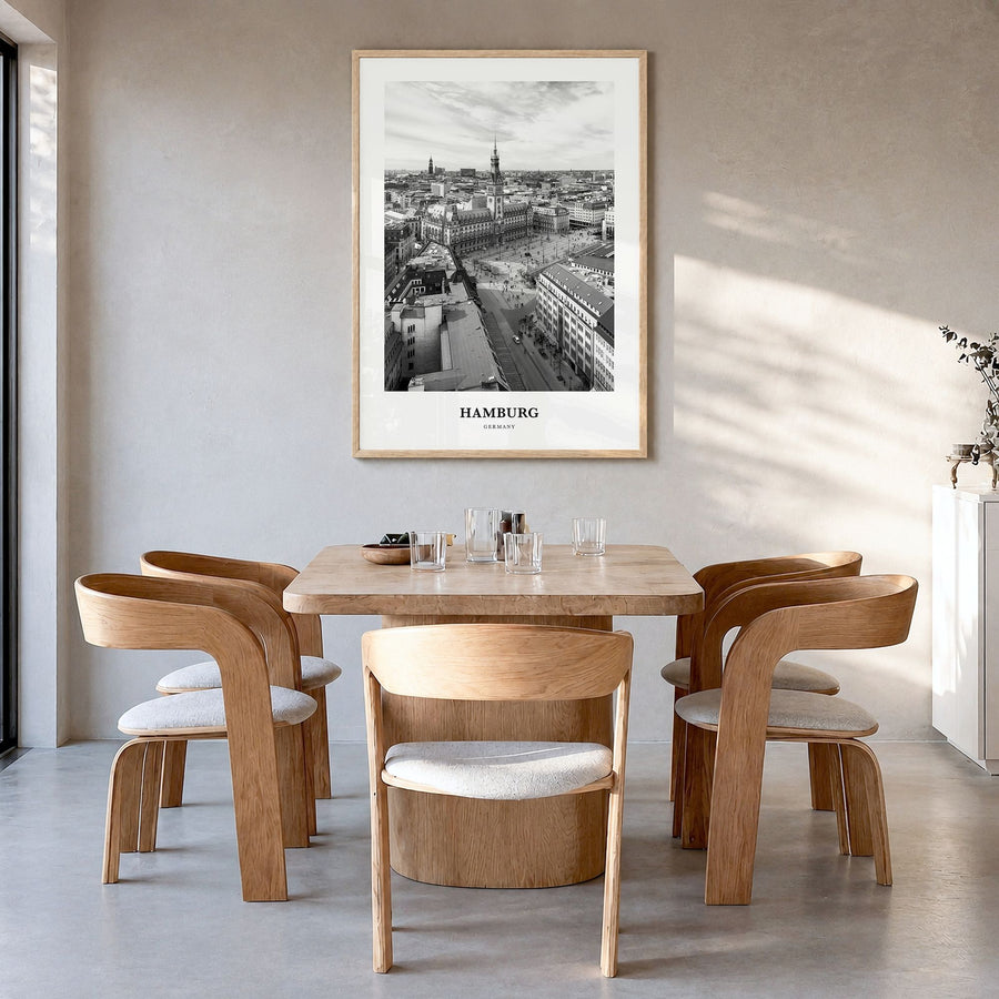 Hamburg Classic No 1 Poster in a natural wood frame, hanging in a dining room