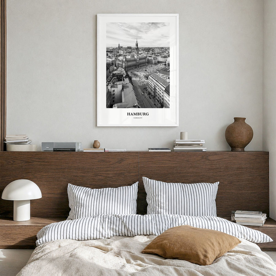 Hamburg Classic No 1 Poster in a white wood frame, hanging in a bedroom