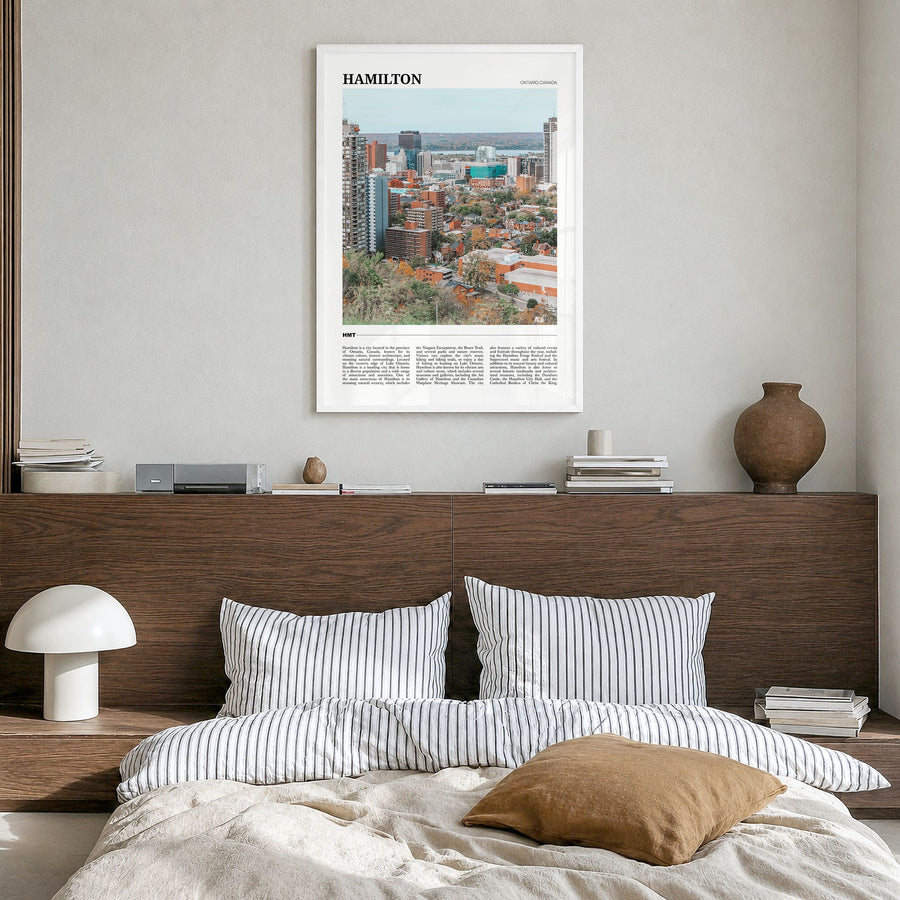 Hamilton, Canada Travel Poster in a white wood frame, hanging in a bedroom