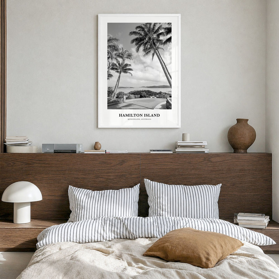 Hamilton Island Classic Poster in a white wood frame, hanging in a bedroom