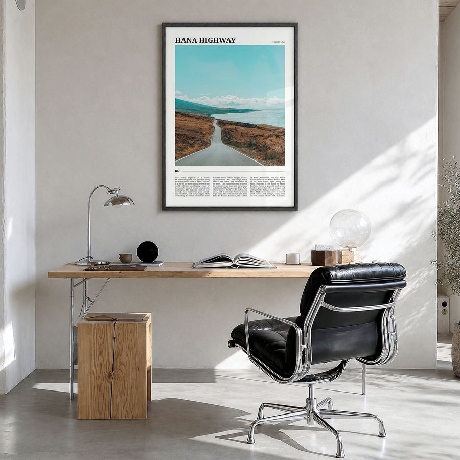 Hana Highway Travel Poster in a black wood frame, hanging in a bright home office