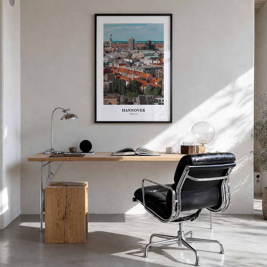 Hannover colorful classic poster of Germany – vertical wall art in black wood frame, hanging on wall