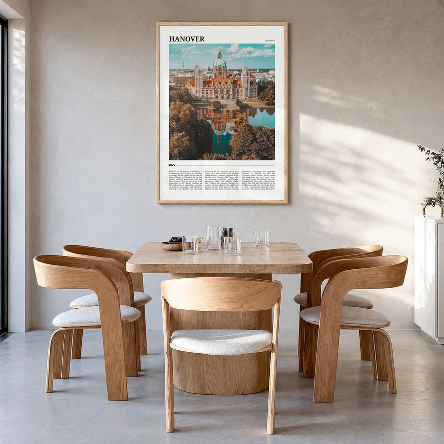 Hanover Travel Poster in a natural wood frame, hanging in a dining room