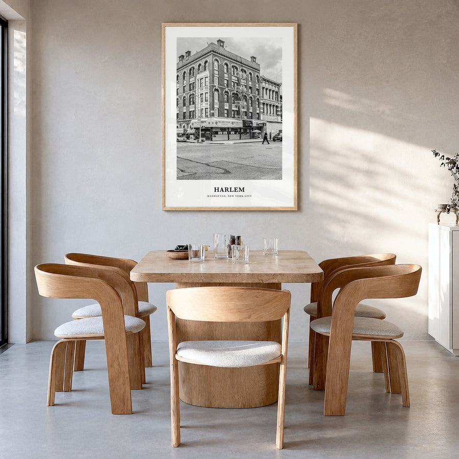 Harlem Classic Poster in a natural wood frame, hanging in a dining room