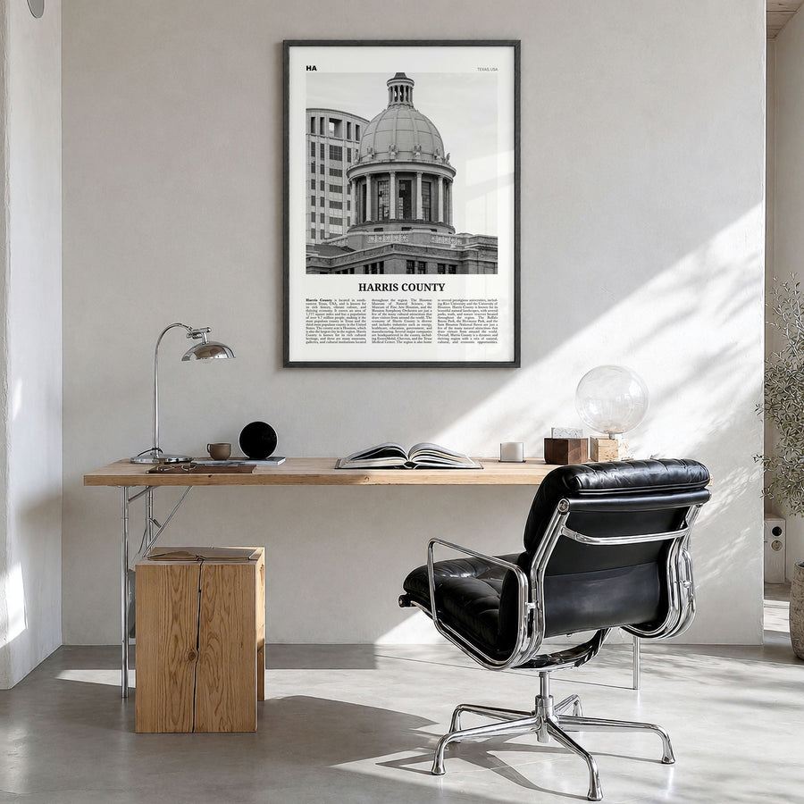 Harris County Newspaper Poster in a black wood frame, hanging in a bright home office